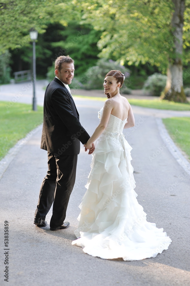 Portrait of a beautiful bride smiling with her handsome groom Portrait of a beautiful bride smiling with her handsome groom