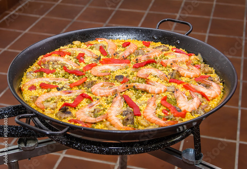 Detail of traditional spanish paella cooked in a pan