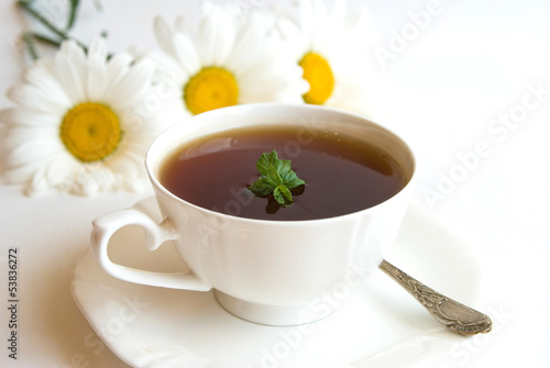 Black tea in a white cup