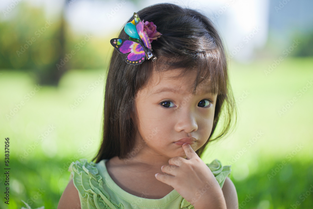 Little girl wondering something Little girl wondering something