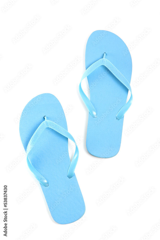 blue flip flops over white blue flip flops over white