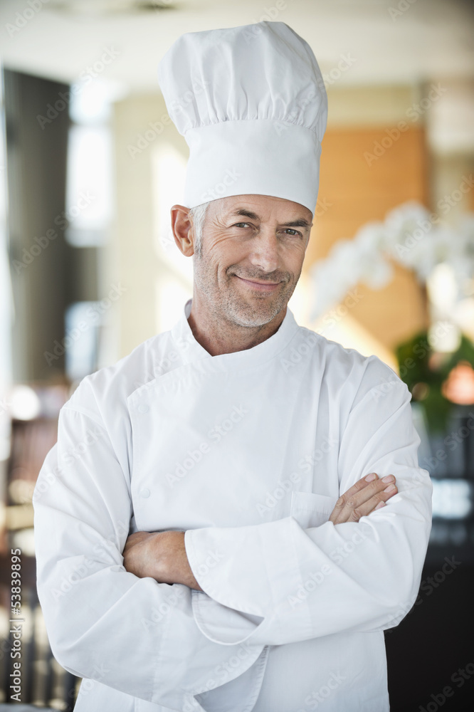 Portrait of a chef smiling with arms crossed Portrait of a chef smiling with arms crossed