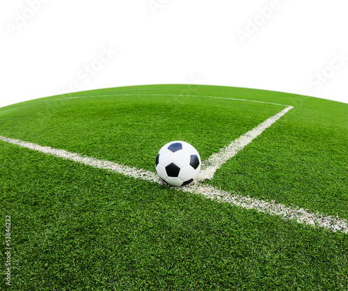 soccer ball on green grass field isolated © tungphoto