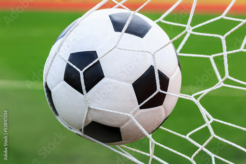 football in goal net © tungphoto