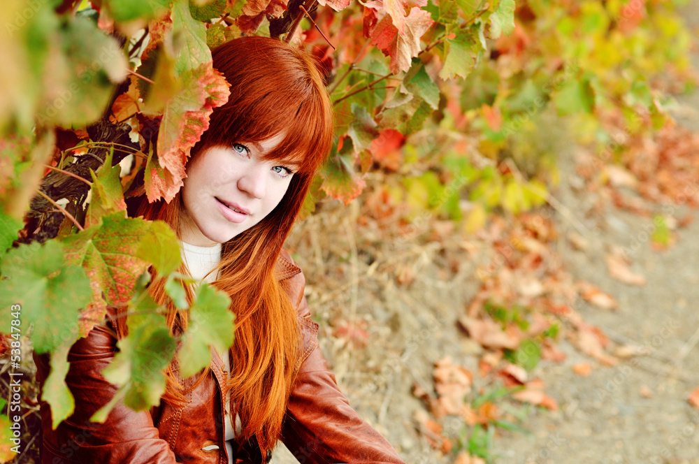 redhead girl in fall time redhead girl in fall time