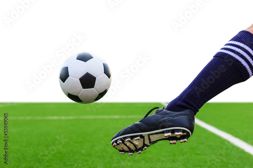 foot kicking soccer ball isolated