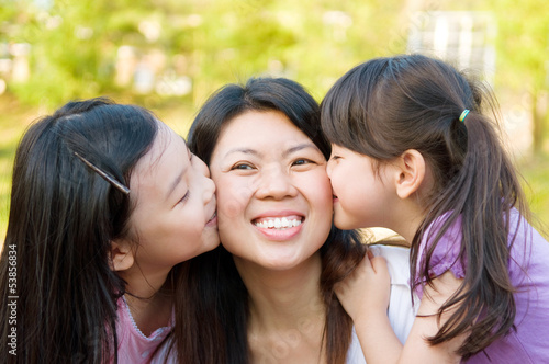 asian girls kiss their mother