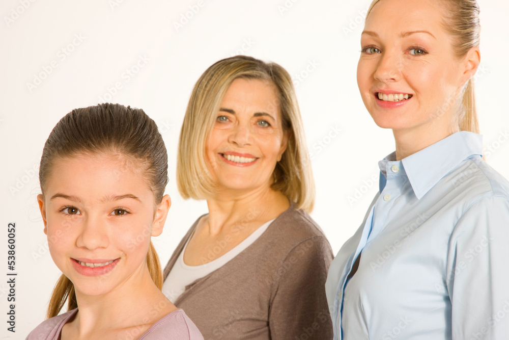granddaughter grandmother young mother standing on white backgro granddaughter grandmother young mother standing on white backgro