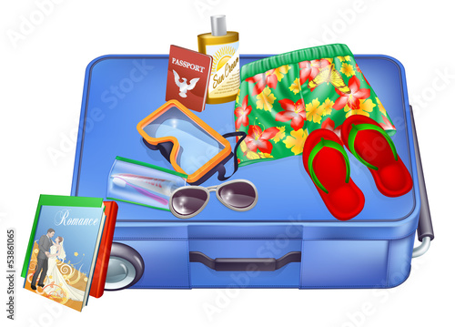 Suitcase and vacation items
