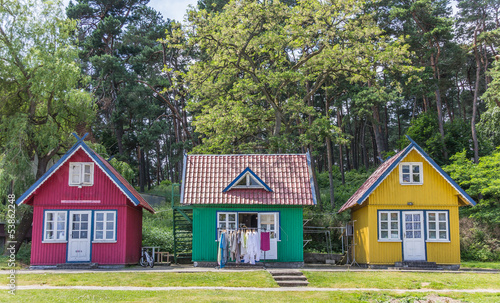 Traditional wooden houses on Curonian Spit photo