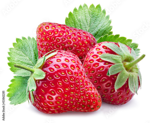 Three ripe strawberries with leaves.