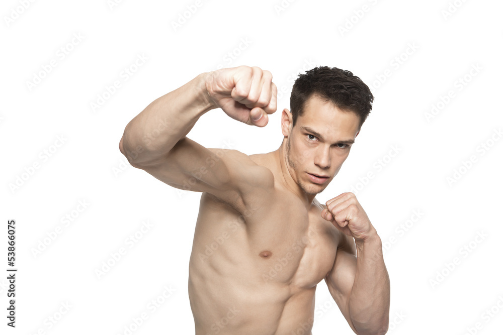 Fototapeta premium Portrait Of Tough Boxing Guy Punching