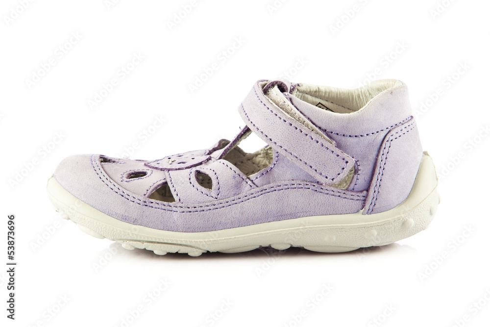 purple sandals for kids. children's shoes isolated on a white ba purple sandals for kids. children's shoes isolated on a white ba