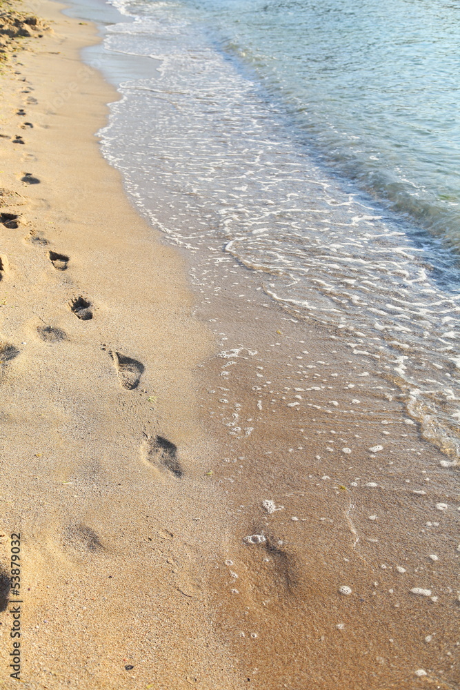 beach, wave and footsteps