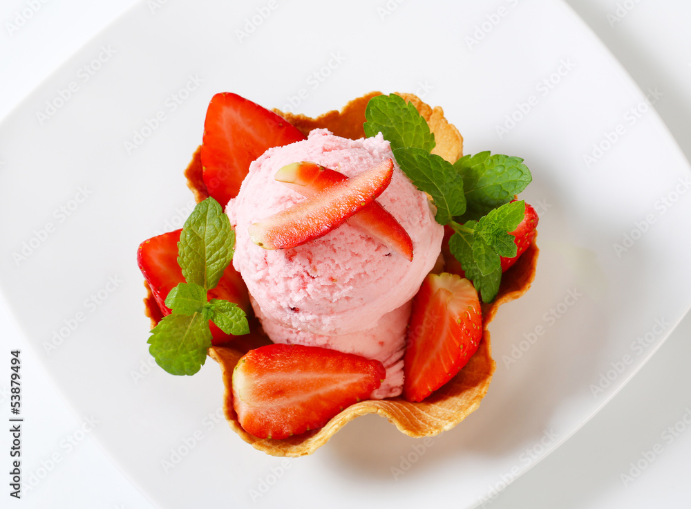 Pink ice cream in waffle basket Pink ice cream in waffle basket