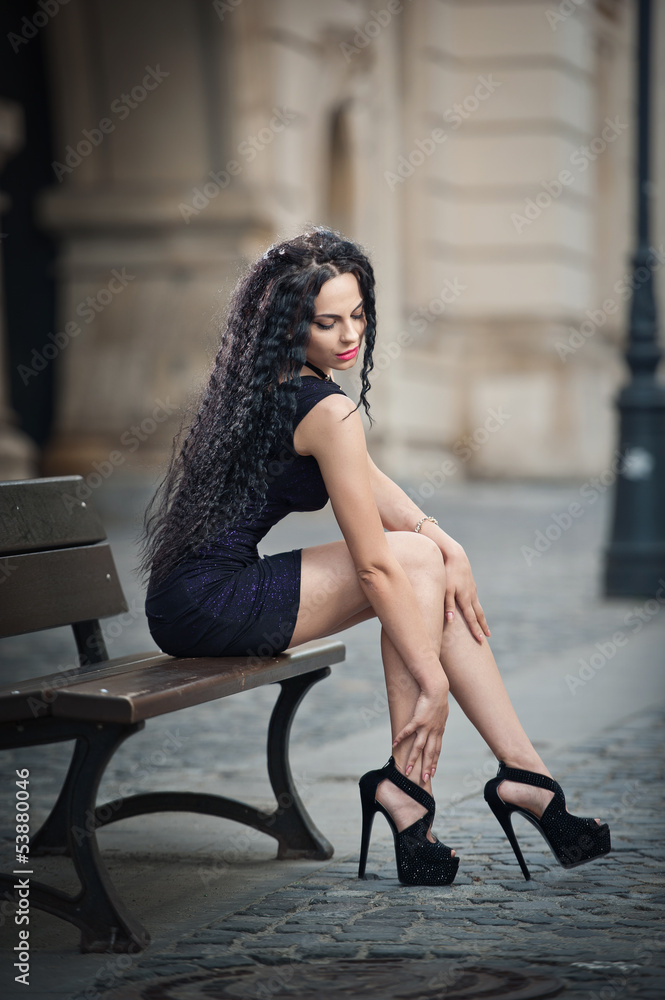 attractive girl wearing short skirt and high heels in the city Photos |  Adobe Stock