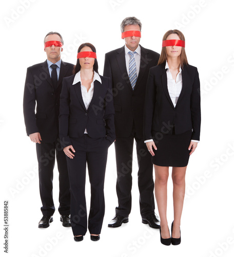 Group Of Business People's Eyes Covered With Ribbon