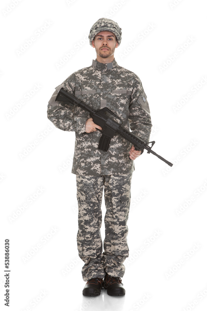 Portrait Of Soldier Holding A Gun Portrait Of Soldier Holding A Gun