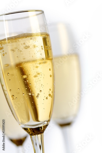 champagne flutes on white background