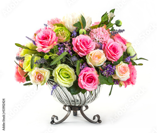 Fototapeta Naklejka Na Ścianę i Meble -  Bouquet of roses in glass vase