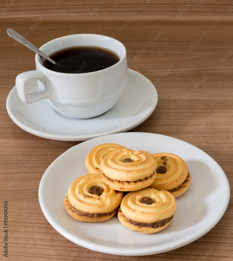Closeup of cookies and a cup of coffee Closeup of cookies and a cup of coffee