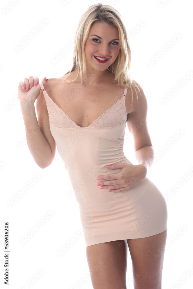 Attractive Sexy Young Woman Posing in Short Tight Mini Dress Attractive Sexy Young Woman Posing in Short Tight Mini Dress