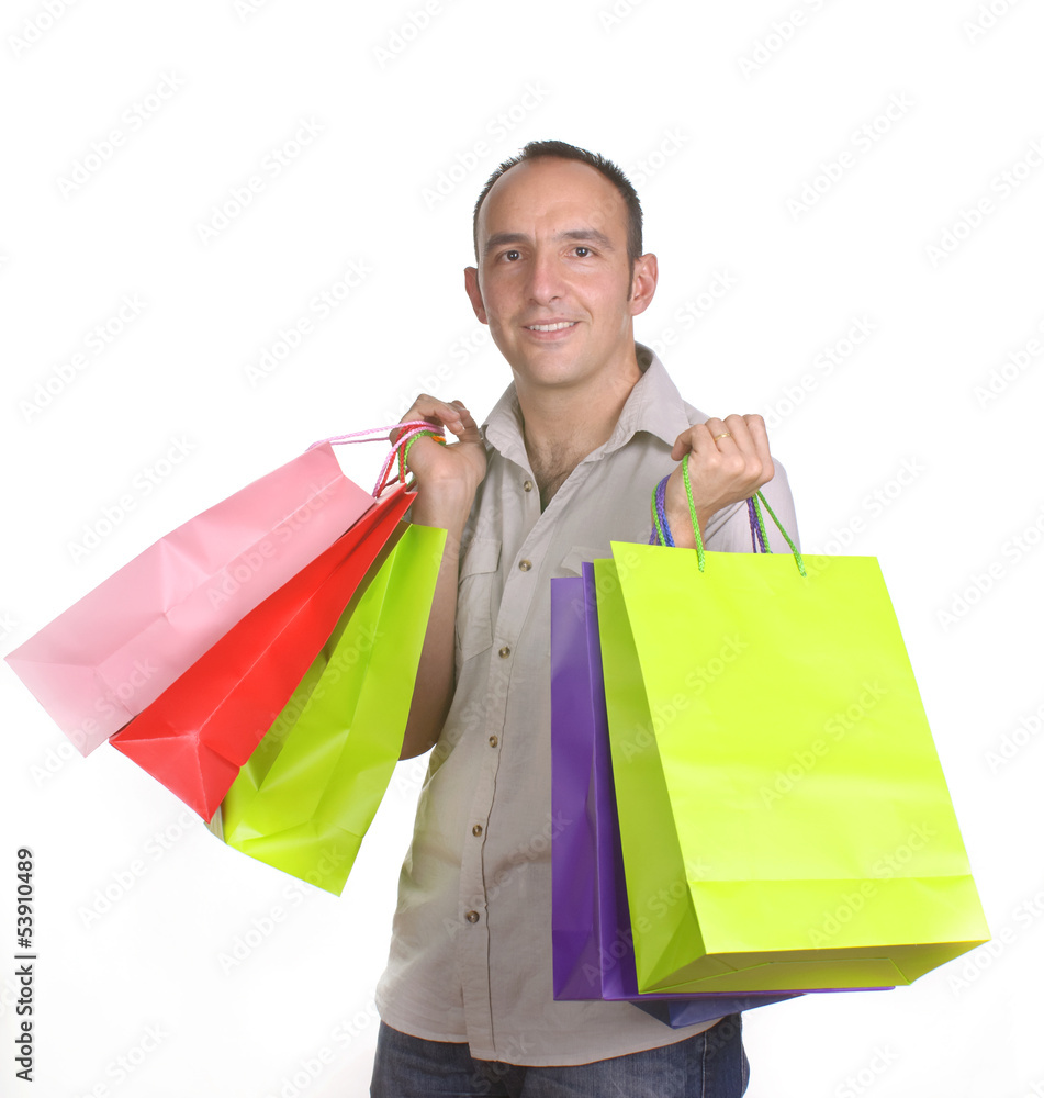 Hombre cargado con bolsas de compras foto de Stock | Adobe Stock