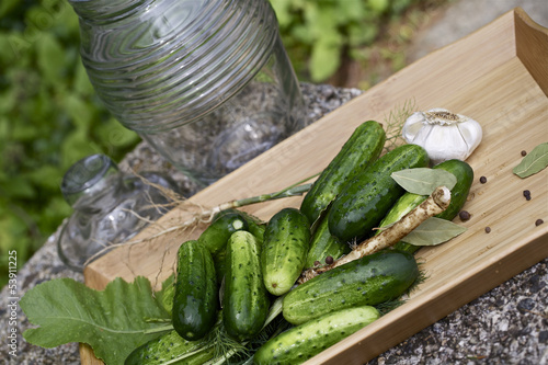 Fresh cucumbers,homemade preserves photo