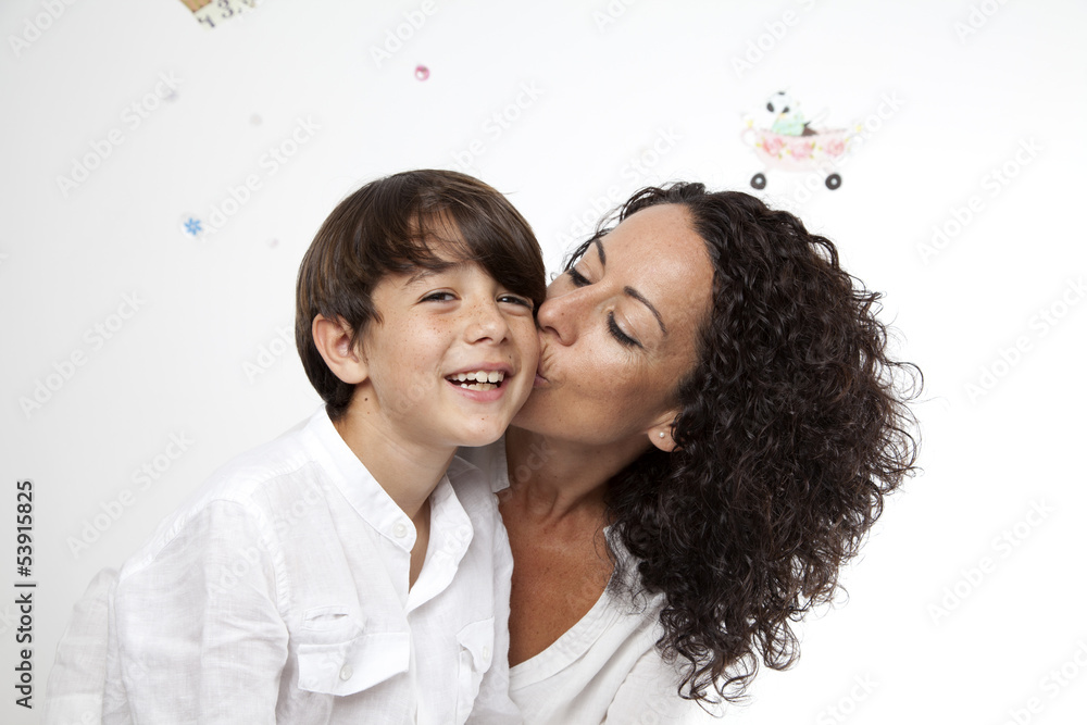 Madre besando a su hijo Stock Photo | Adobe Stock
