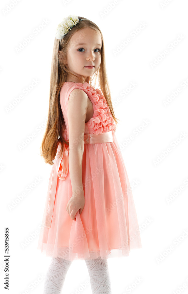 Charming little girl in pink dress and rim Charming little girl in pink dress and rim