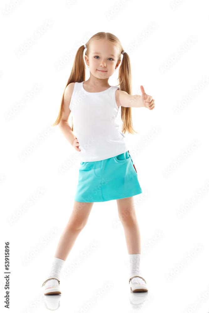Image of charming little girl showing thumbs up Image of charming little girl showing thumbs up