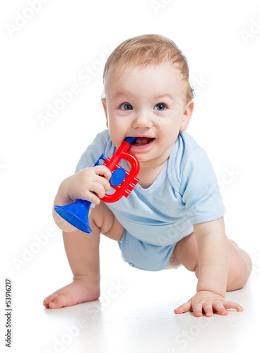smiling boy baby  with musi...
