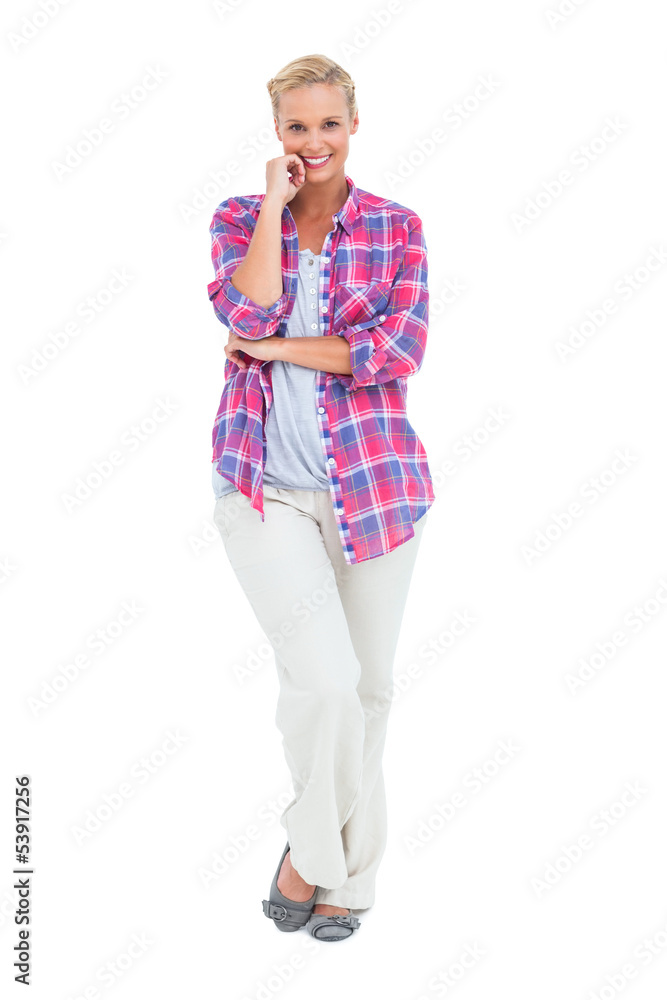 Happy woman standing looking at camera Happy woman standing looking at camera