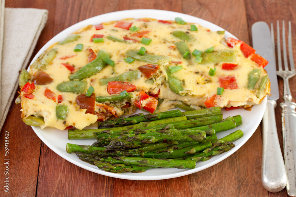 omelette with vegetables and asparagus on the plate omelette with vegetables and asparagus on the plate
