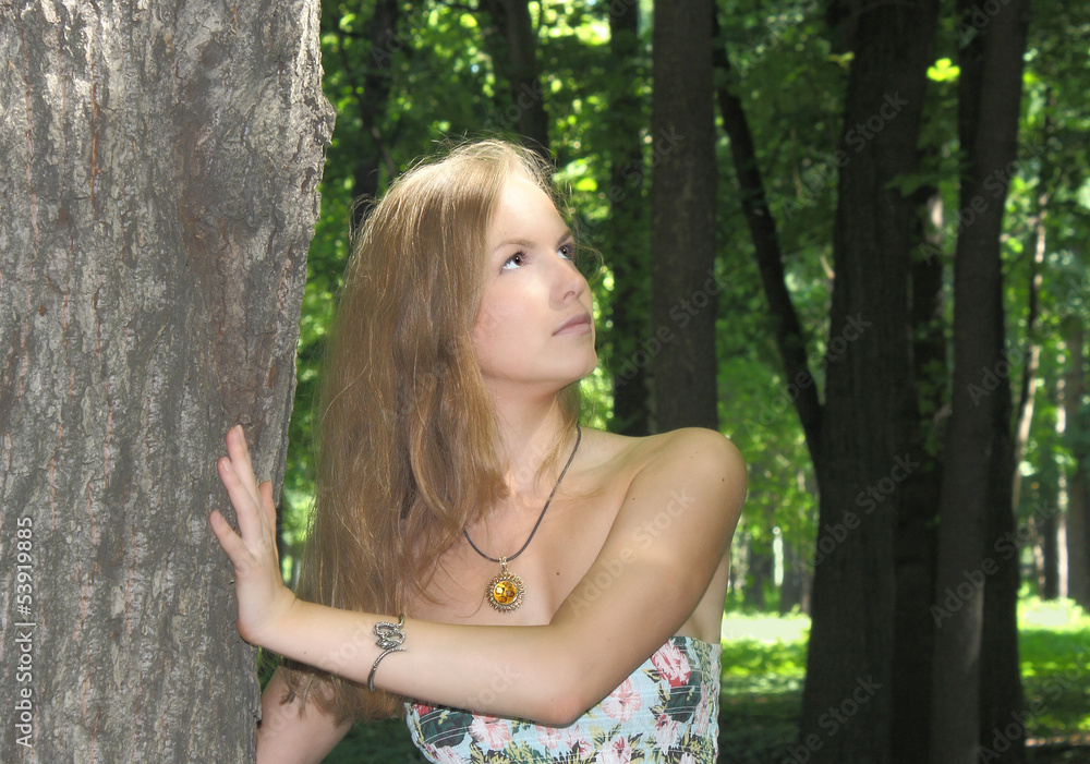 Beautiful girl in a summer park Beautiful girl in a summer park