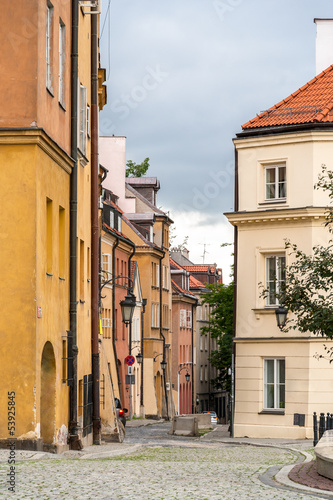 Narrow street in Warsaw old city - Poland #53925845