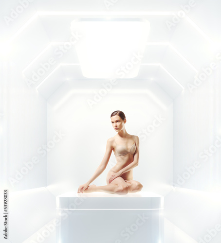 shining futuristic interior and young woman