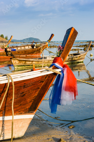 Fishing boats on the sea shore in Thailand © Oleg Zhukov