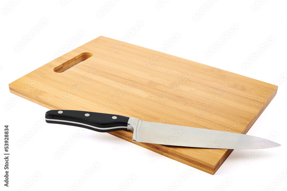 Steel kitchen knife on cutting board Steel kitchen knife on cutting board