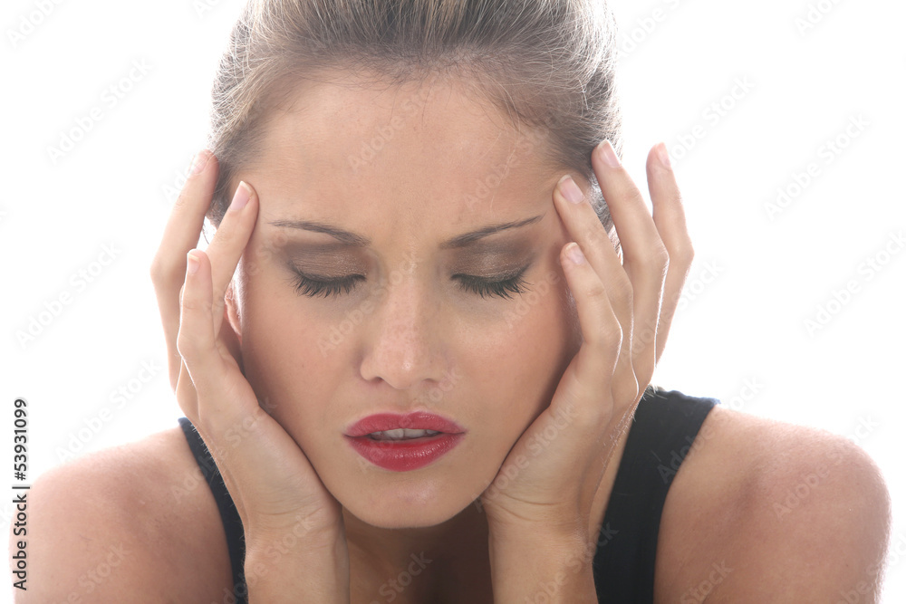 Model Released. Stressed Young Woman With a Headache Model Released. Stressed Young Woman With a Headache