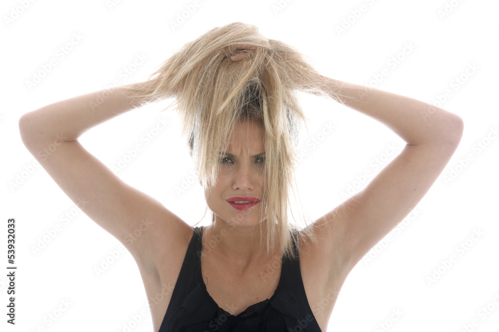 Model Released. Young Woman Styling Hair Model Released. Young Woman Styling Hair