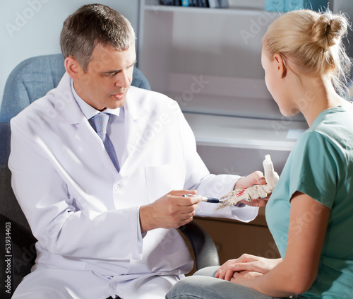 doctor in his office and the patient