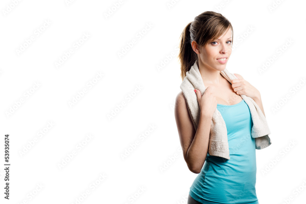 Pretty blonde girl holding a towel and looking at camera Pretty blonde girl holding a towel and looking at camera