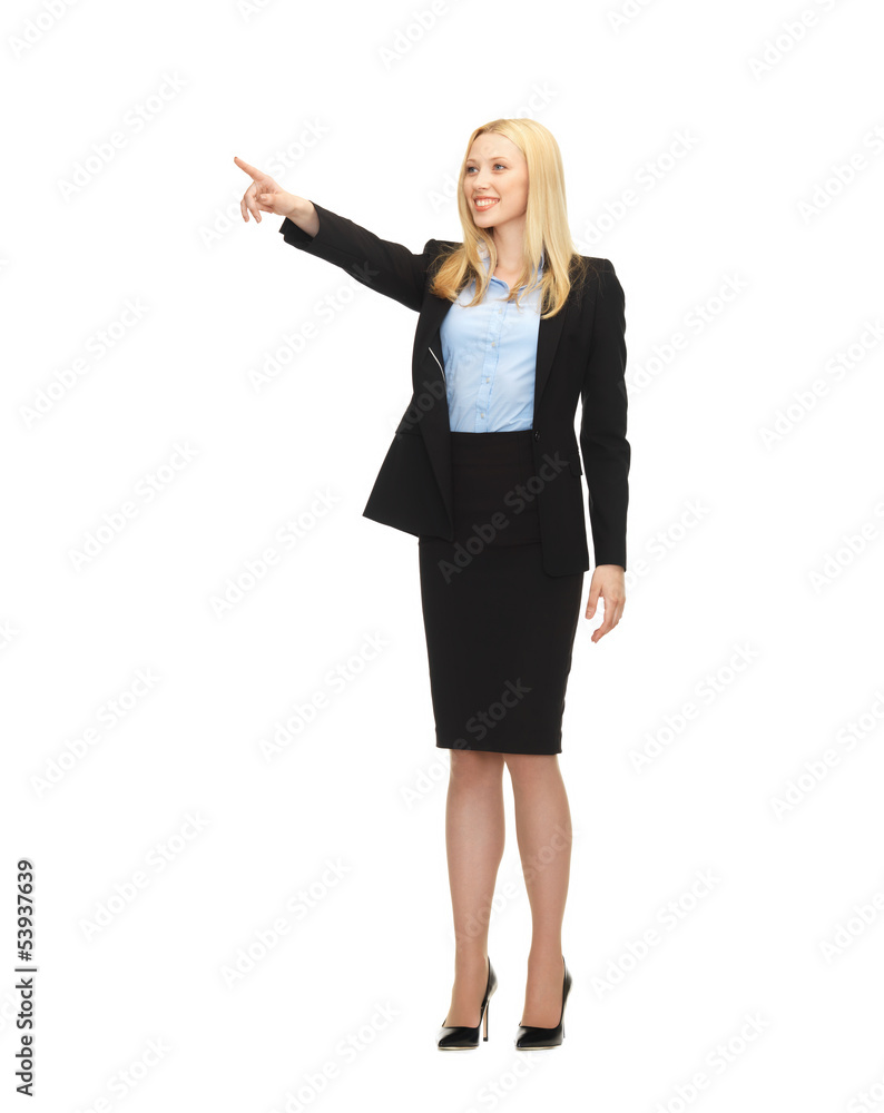 attractive businesswoman pointing at something attractive businesswoman pointing at something