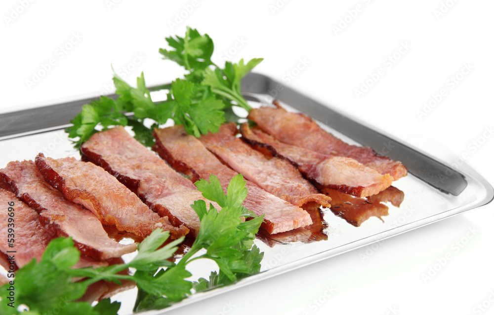 Fried bacon on metal tray isolated on white Fried bacon on metal tray isolated on white