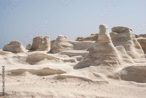 Caves and rock formations by the sea at Sarakiniko area on Milos