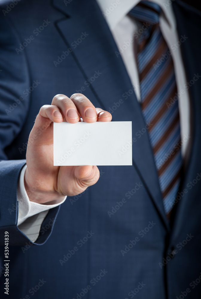 Man's hand showing business card Man's hand showing business card