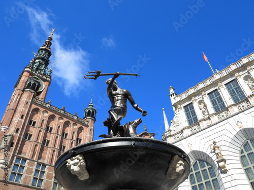 Neptune Fountain and city hall in Gdansk - Poland