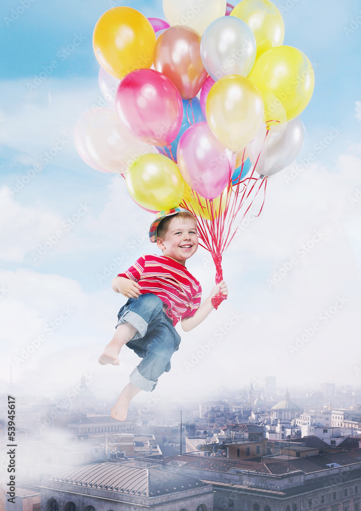 Funny image presenting kid flying by the balloons Funny image presenting kid flying by the balloons