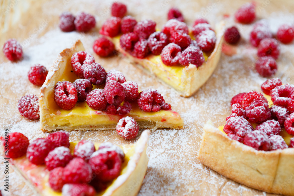 slices of cake with custard and raspberry slices of cake with custard and raspberry